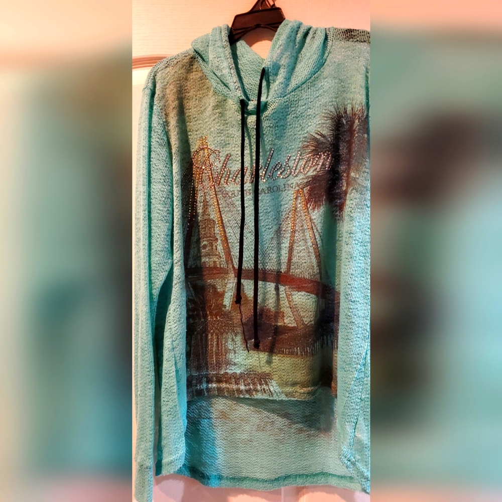 Aquamarine long sleeved lightweight shirt.